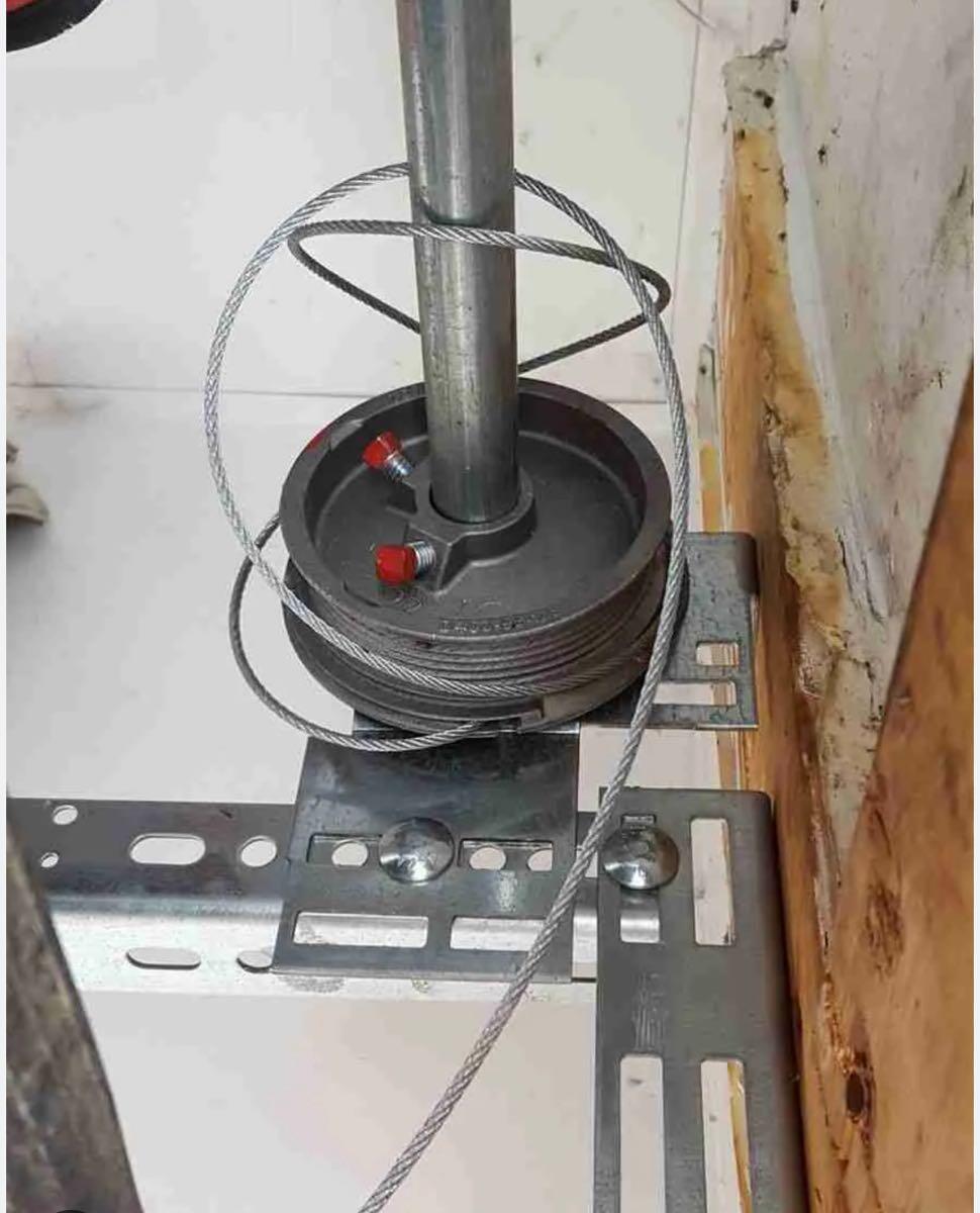 Professional garage door cable and track repair service in Richmond, Virginia by American Door & More